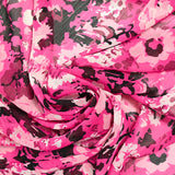 Mousseline crinkle imprimée nuage de fleurs fond fuchsia