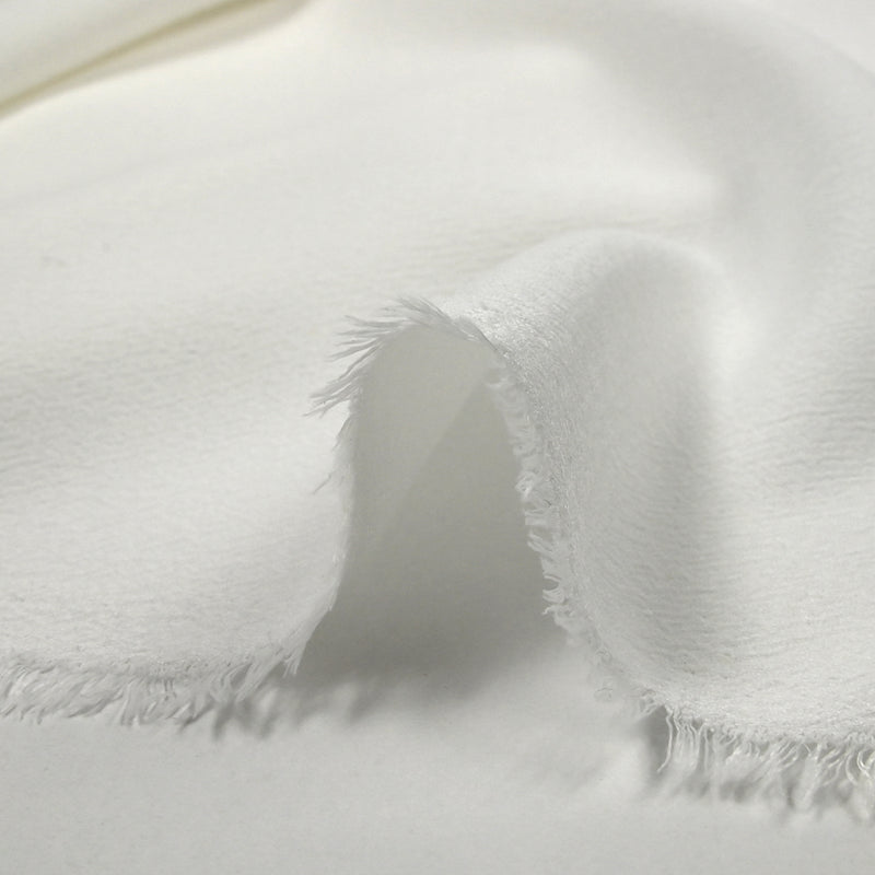Crêpe de polyester blanc cassé