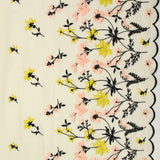 Mousseline de soie brodée festonnée écru au mètre