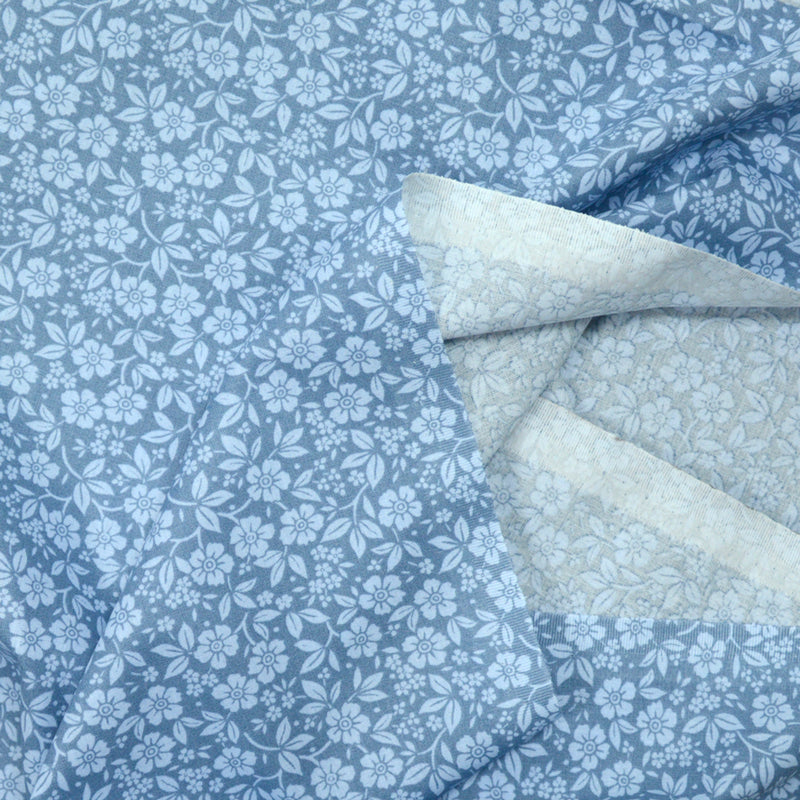 Coton imprimé Palma de Majorque fond gris bleuté