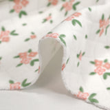 Jersey de coton matelassé imprimé fleurettes fond blanc