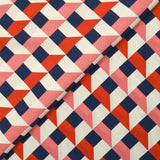 Crêpe viscose imprimé géométrie variable corail et marine fond écru