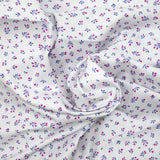 Coton imprimé tulipe fond blanc cassé
