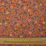 Crêpe viscose imprimé fleurs orange fond cassis glacé