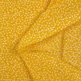 Follaje estampado de algodón con follaje estampado de fondo amarillo