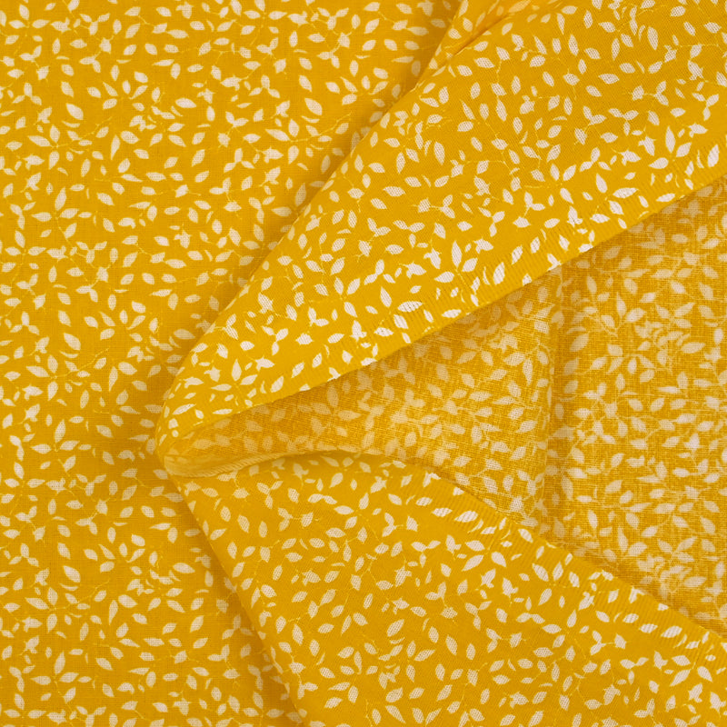 Follaje estampado de algodón con follaje estampado de fondo amarillo