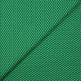 Popeline de coton imprimée mini étoiles fond vert