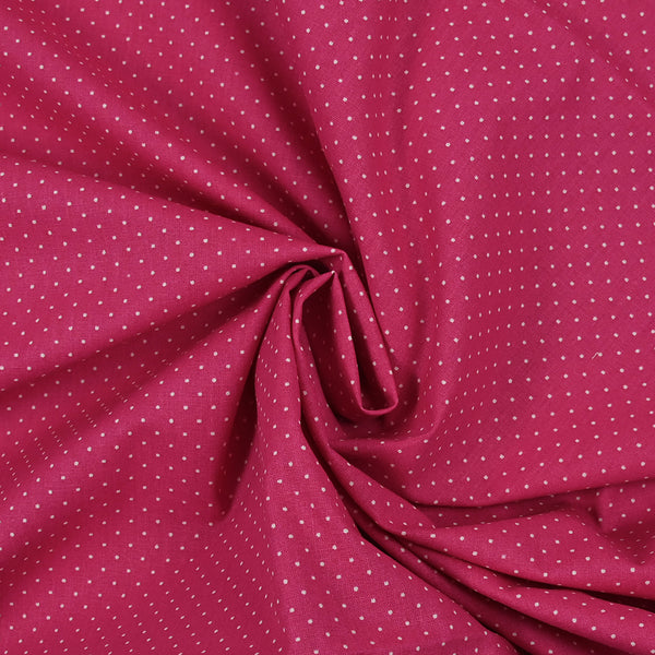 Popeline de coton imprimée mini pois fond fuchsia