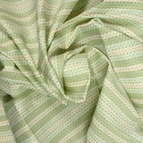 Coton imprimé torsade fond vert