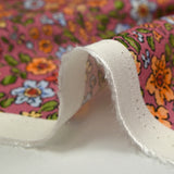 Crêpe viscose imprimé envolée florale fond cassis glacé