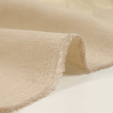 Crêpe viscosa flores iridiscentes bordadas fondo marino beige