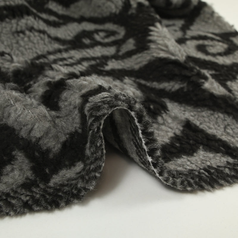 Lainage polyester sherpa tourbillon noir et gris