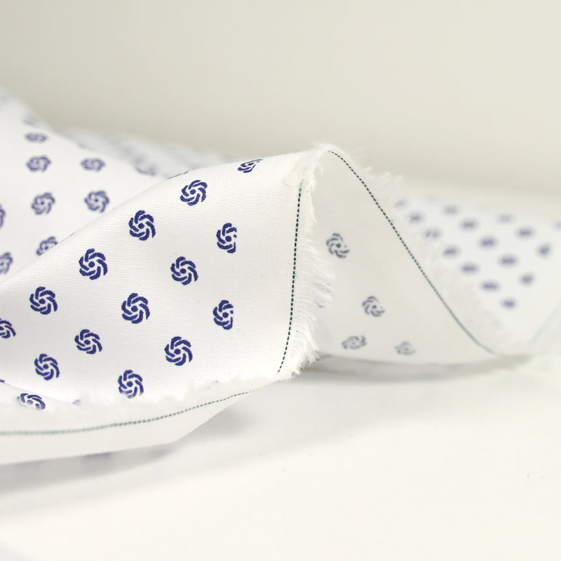 Coton imprimé ellipse marine fond blanc