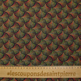 Viscosa estampada pavo real sobre fondo negro punteado rojo, amarillo y verde
