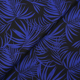 Viscose printed tropical leaves in royal blue with black background