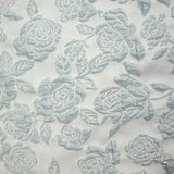 Brocart polyester rosier fond bleu givré