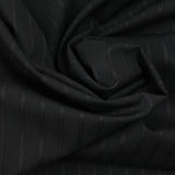 Fondo negro de tela de lana de lana rosa