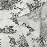 Viscose printed with black toile de Jouy on an off-white background