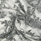 Viscose printed with black toile de Jouy on an off-white background