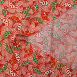 Viscose imprimée fleurs de mariage rouge fond pêche