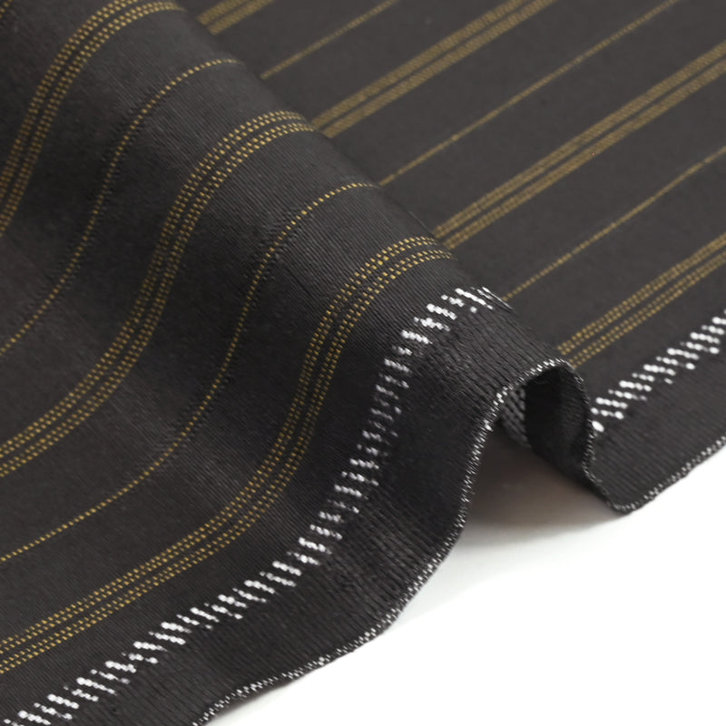 100% wool tailor fabric 4 strips dark brown background