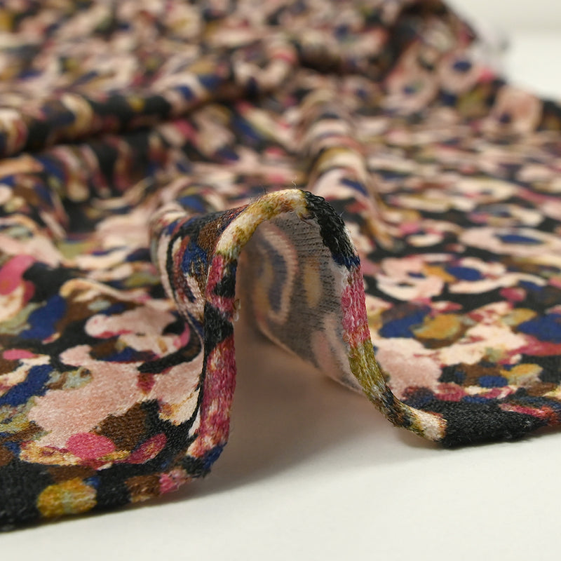 Maille polyester imprimée pluralité rose et bleu fond noir