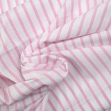 Popeline de coton tissée-teinte rayée rose fond blanc