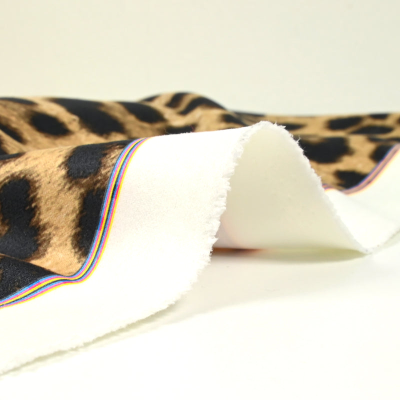 Scuba toucher suédine imprimé léopard fond camel