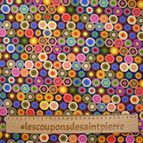 Coton imprimé cercles des sixties multicolore fond noir