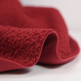 Lainage bouclette envers polaire rouge
