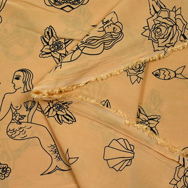 Viscose imprimée légère sirène fond pêche