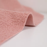 Lainage bouclette envers polaire rose