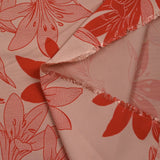 Polyviscose imprimée jungle flower rouge fond rose