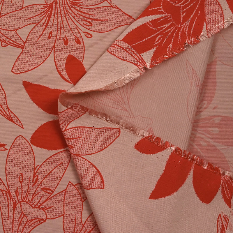 Polyviscose imprimée jungle flower rouge fond rose