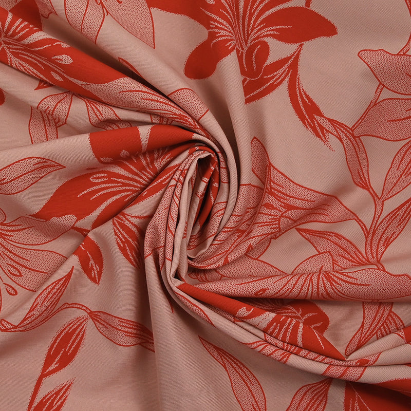 Polyviscose imprimée jungle flower rouge fond rose