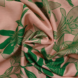 Light printed viscose jungle green flower pink background