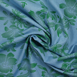Fancy printed polyester green flowers blue sky background