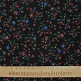 Flores de polviscosis impresas de fondo negro antiesteryear