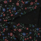 Flores de polviscosis impresas de fondo negro antiesteryear