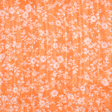 Mousseline crinkle imprimé fleurs fond orange