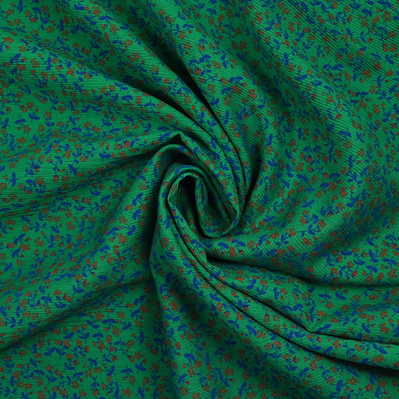 Viscose imprimée texturée mini fleurs fond vert