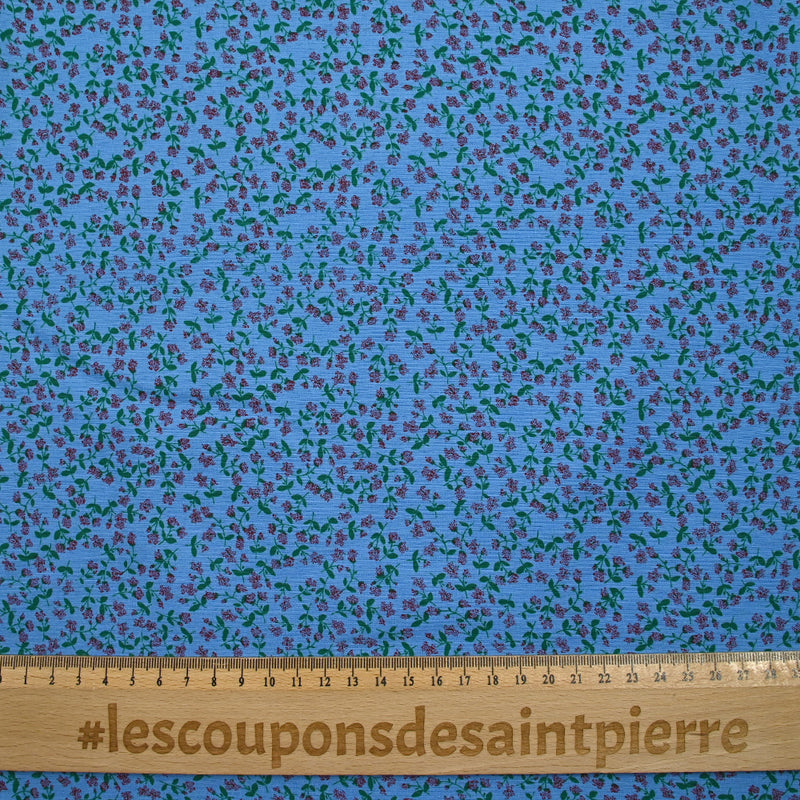 Viscose imprimée mini fleurs fond bleu