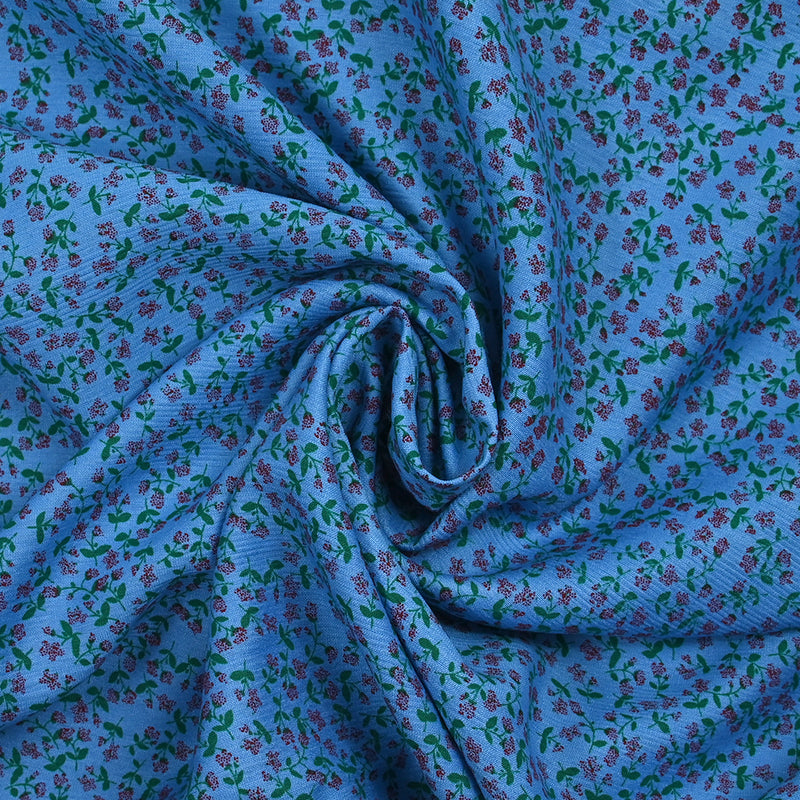 Viscose imprimée mini fleurs fond bleu