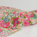 Liberty ® cotton Elysian day fuchsia and green by the meter