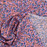 Viscose imprimée rêve botanique fond fraise glacé