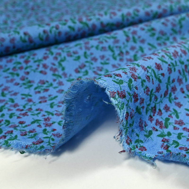Viscose imprimée mini fleurs fond bleu
