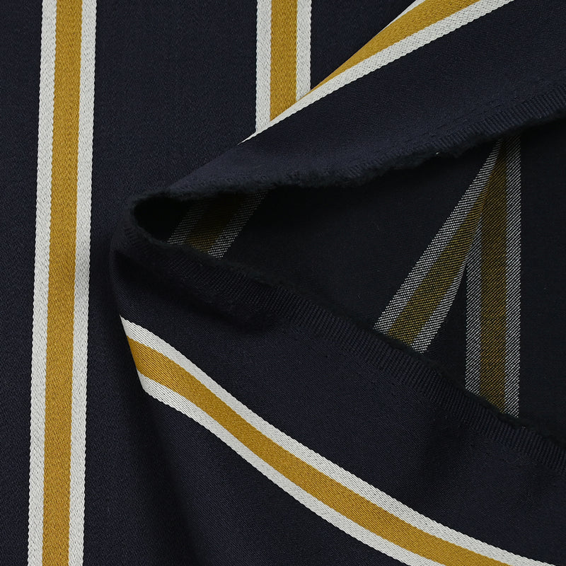 Gabardine de laine mélangée rayée écru et moutarde fond marine