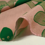 Light printed viscose jungle green flower pink background