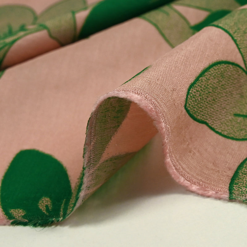 Light printed viscose jungle green flower pink background