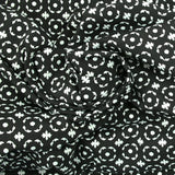 Jacquard polycoton éternel fond noir